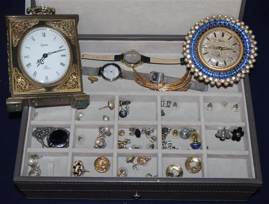 Two clocks and a group of assorted costume jewellery.